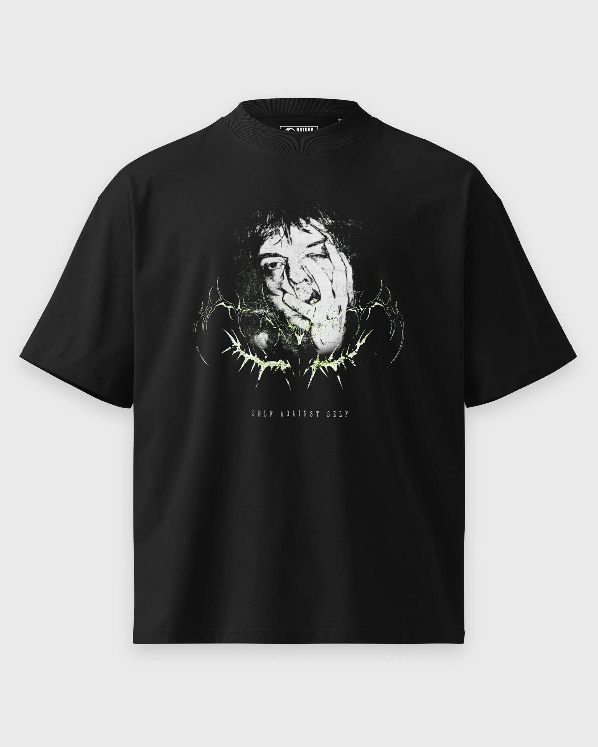 Schwarzes oversized T-Shirt mit SELF AGAINST SELF Frontmotiv in der Vorderansicht.